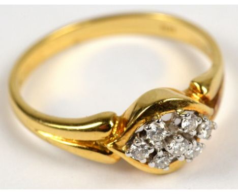 An 18ct yellow gold and diamond ring set with seven stones in claw setting, each approx 0.03ct, size N, 2.9g.