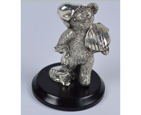 HARMAN BROS; an Elizabeth II hallmarked silver filled figure of a teddy bear with blanket and hot water bottle, Birmingham 19