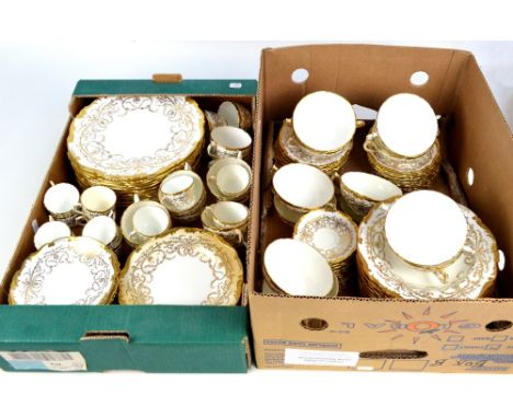 A large quantity of Coalport tea and dinner ware in "Anniversary" gold and white pattern comprising eleven dinner plates, twe