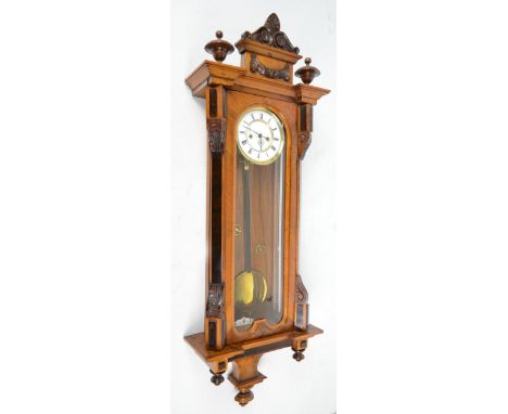 A rare 19th century walnut and ebonised miniature Vienna regulator wall clock with two piece white enamel dial, scrolling ped