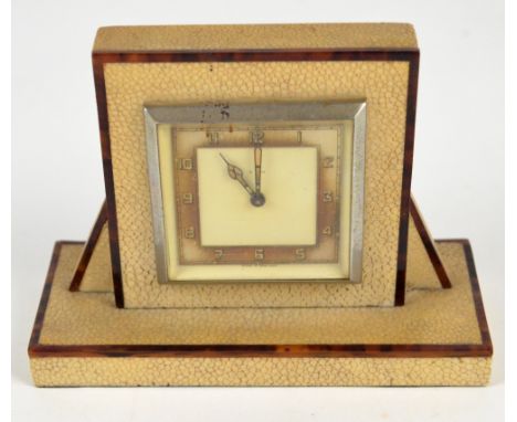 An Art Deco shagreen and tortoiseshell eight day desk clock, marked Smiths to back, height 11cm. CONDITION REPORT: The dial i