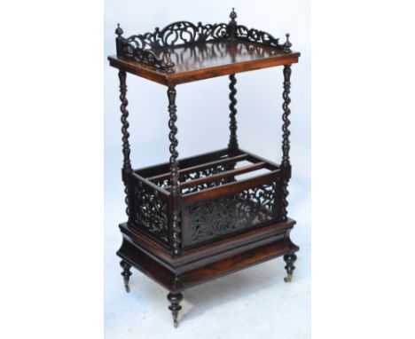 A Victorian rosewood Canterbury whatnot, the pierced three quarter gallery above upper shelf, Canterbury lower section with s