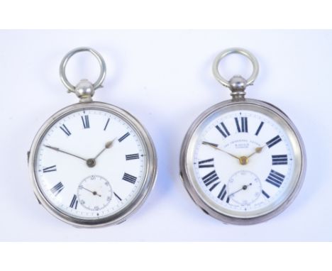 A George V hallmarked silver key wind open face pocket watch, the white enamel dial set with Roman numerals and subsidiary se