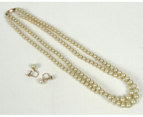 A faux pearl bead double string necklace with 9ct rose gold clasp and a pair of simulated pearl ear clips.