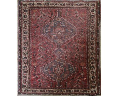 A red ground Qashqai carpet, 150cm x 100cm