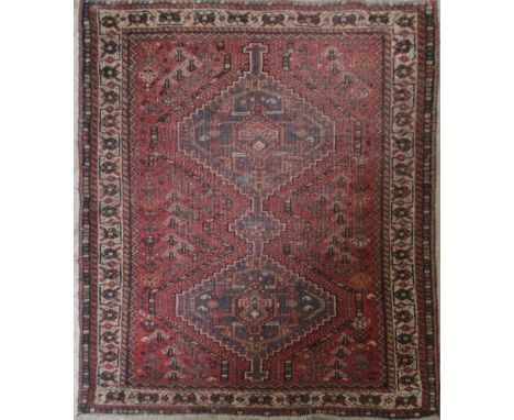 A red ground Qashqai carpet, 150cm x 100cm