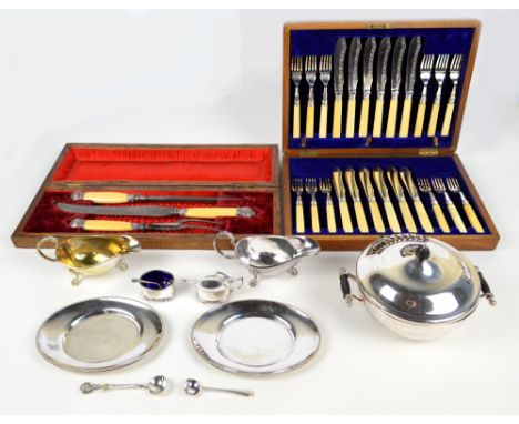 A quantity of silver plated items including a lidded serving dish, sauce boats, two piece cruet, a cased set of twelve fish k