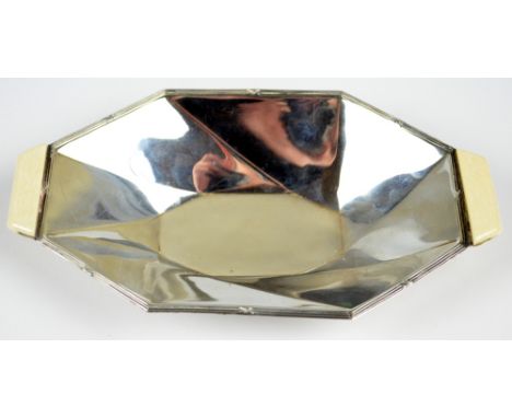 VINERS; a George V silver Jubilee hallmarked silver Art Deco dish of oblong octagonal form with ivorine twin handles, London,