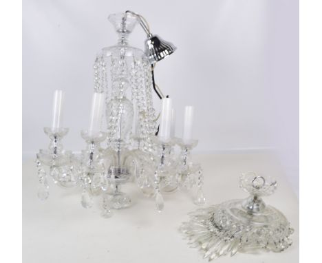 A cut glass eight branch electrolier with swag drops, length approx 67cm and a simple cut glass light fitting (2).