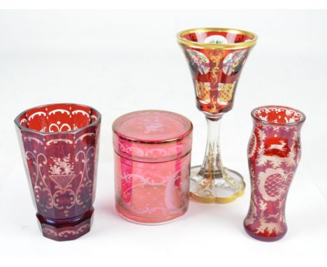 A Schloss Herblingen ruby glass flash cut and over painted chalice, height 20.5cm, an Egermann Bohemian ruby flash cut vase, 