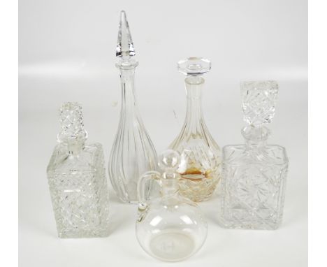 A Baccarat tapered cut crystal decanter, an Orrefors shouldered cut decanter, two further cut crystal examples and a blown gl