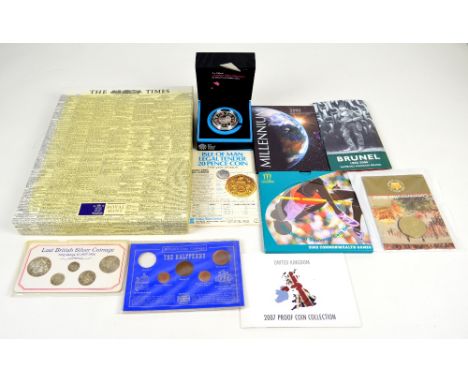 A collection of various commemorative proof coins to include the Official London 2012 Olympic £5 coin, the First Millennium £