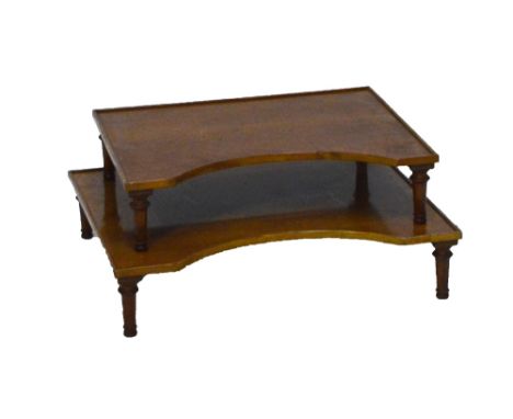 A pair of graduated satinwood trays on four ring turned tapering supports, the larger 74 x 64.5cm.