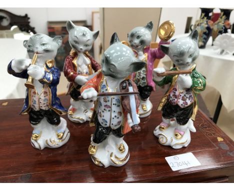 Five ceramic cat band figures
