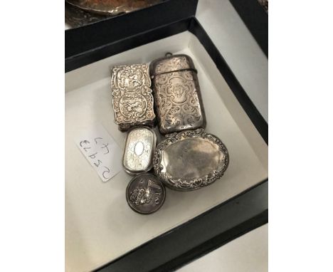 A HM silver pill box, vesta, vinaigrette and snuff box