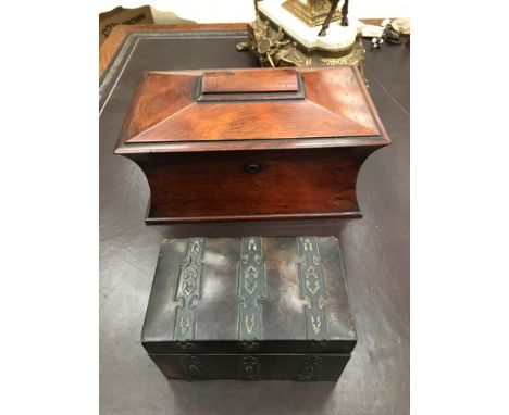 A 19th century sarcophagus-shaped tea caddy; together with iron bended examples 