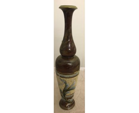 A Doulton Lambeth stoneware vase by Elizah Simmance decorated with foliage in the Art Nouveau style