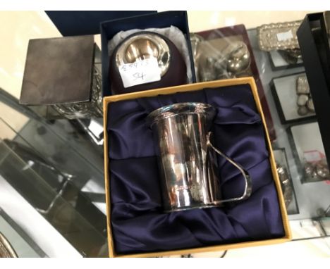 A HM silver inkwell; together with a matchstrike and christening cup