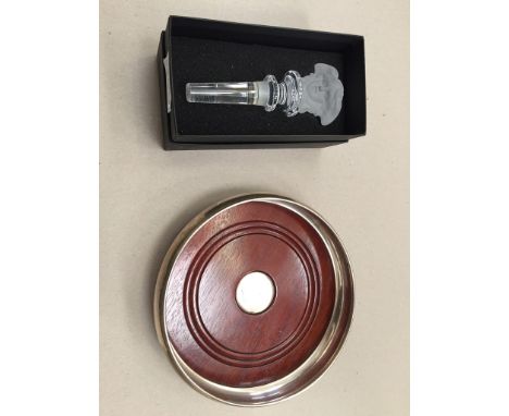 A modern silver ship's decanter coaster; together with a boxed Versache bottle stopper