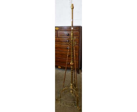 A Victorian Aesthetic Movement copper and brass floor standing lamp, manner of W.A.S. Benson 