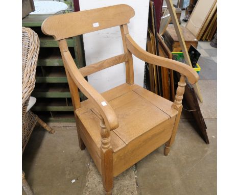 A Victorian pine commode chair 