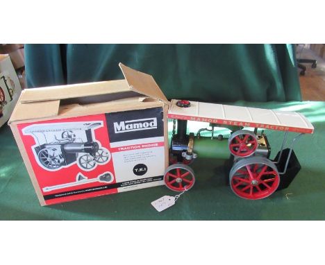 A boxed Mamod steam tractor in plain buff cardboard packaging.