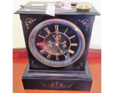 A 19th century French black slate mantle clock, with eight day movement, visible anchor escapement and gilded Roman dial.