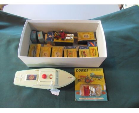 A mid-20th century clockwork Sutcliffe motor boat, together with a small collection of boxed Lesney die-cast model vehicles, 