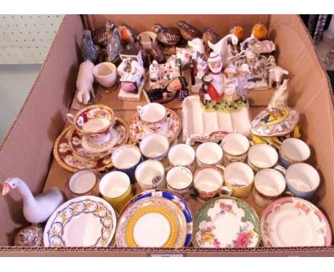 A mixed lot of decorative ceramics, including: a small Royal Doulton Winston Churchill character jug, British birds, a Yardle