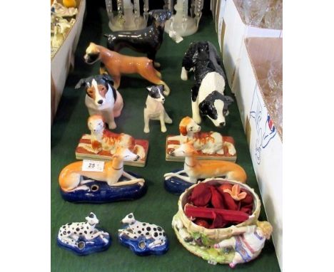 Two pairs of reproduction Staffordshire-type book stand, an unmarked ceramic model of a boxer dog, a Coopercraft Doberman, a 