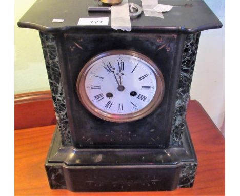 A Victorian black slate and variegated marble mantle clock, with eight day movement and enamel Roman dial.