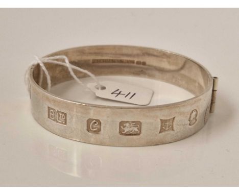A large hallmarked silver bangle 30 gms