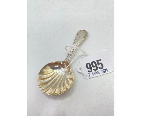 A George III caddy spoon with shell bowl, bright cut handle London 1801 by SG EW IW
