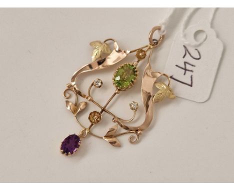A EDWARDIAN ART NOUVEAU SUFFRAGETTE PENDANT SET WITH AMETHYST DIAMONDS AND A PERIDOT 9CT