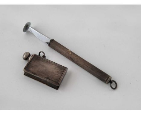 A pipe tamper and a lighter