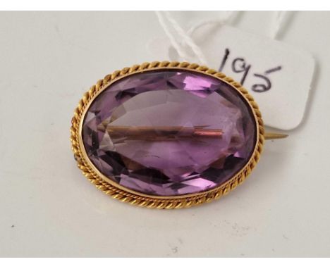 A amethyst brooch 9ct