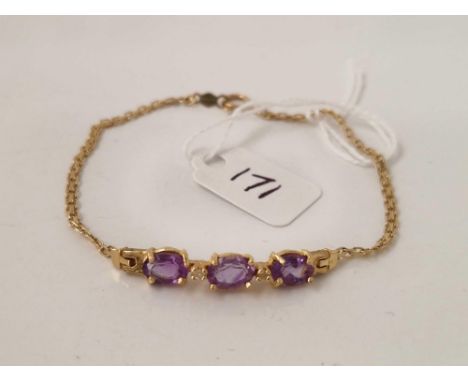 A amethyst and diamond bracelet 14ct gold 6.5 inches 3.5 gms