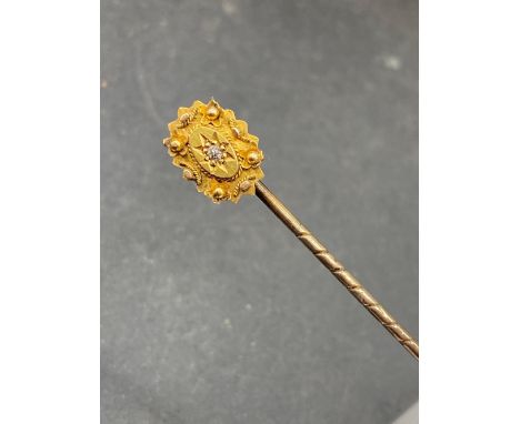 A Victorian diamond fancy stick pin with screw top 15ct gold