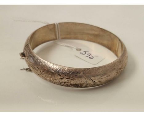 A silver hinged bangle 20 gms