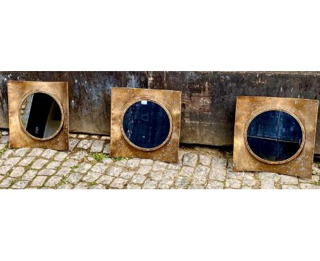 ARCHITECTURAL ACCENT MIRRORS, a set of three, concave bronzed frames, with circular plates, 40cm x 40cm. (3) 