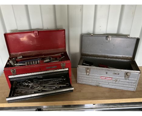 Two Craftsman toolboxes with tools such as sockets, Craftsman spanner sets and other