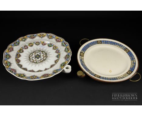 Two Victorian hot plates, a 'Clarence Star' ceramic example, the other of copper with ceramic plate (2)