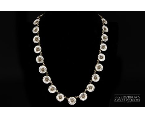 Magnus Aase - a Norwegian silver gilt and enamel necklace formed as a daisy chain, makers mark AM beneath a crown in a rounde