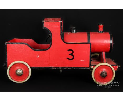 Child's early/mid 20thC pedal car in the form of a red steam engine