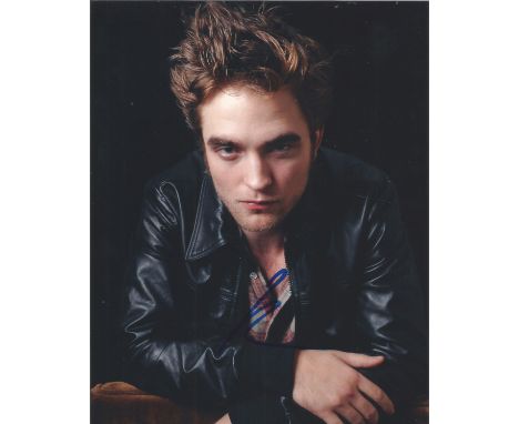Robert Pattinson signed 10x8 colour photo. Robert Douglas Thomas Pattinson (born 13 May 1986) is an English actor. After star