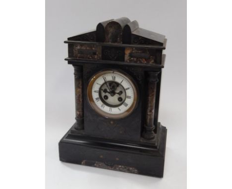 A Victorian eight day mantel clock, in an architectural grey slate and marble inset case, with white enamelled chapter ring a