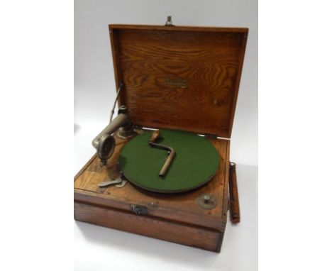 An Edison Bell handerphon portable record player, in oak case.