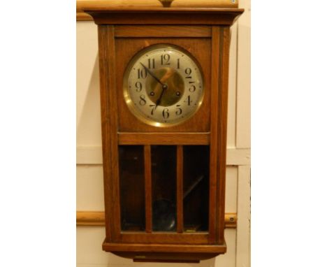 An oak cased eight day mantel clock, 58cm.
