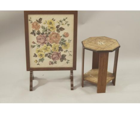 A early 20thC inlaid mahogany octagonal low occasional table, with star inlay motif at the top, 31cm dia. and a fire screen w