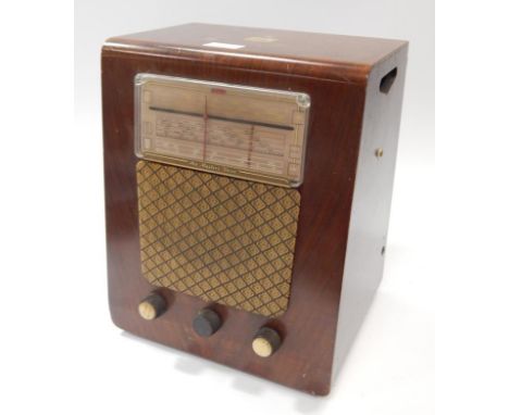 An HMV vintage table radio/record player,  in figured walnut case.